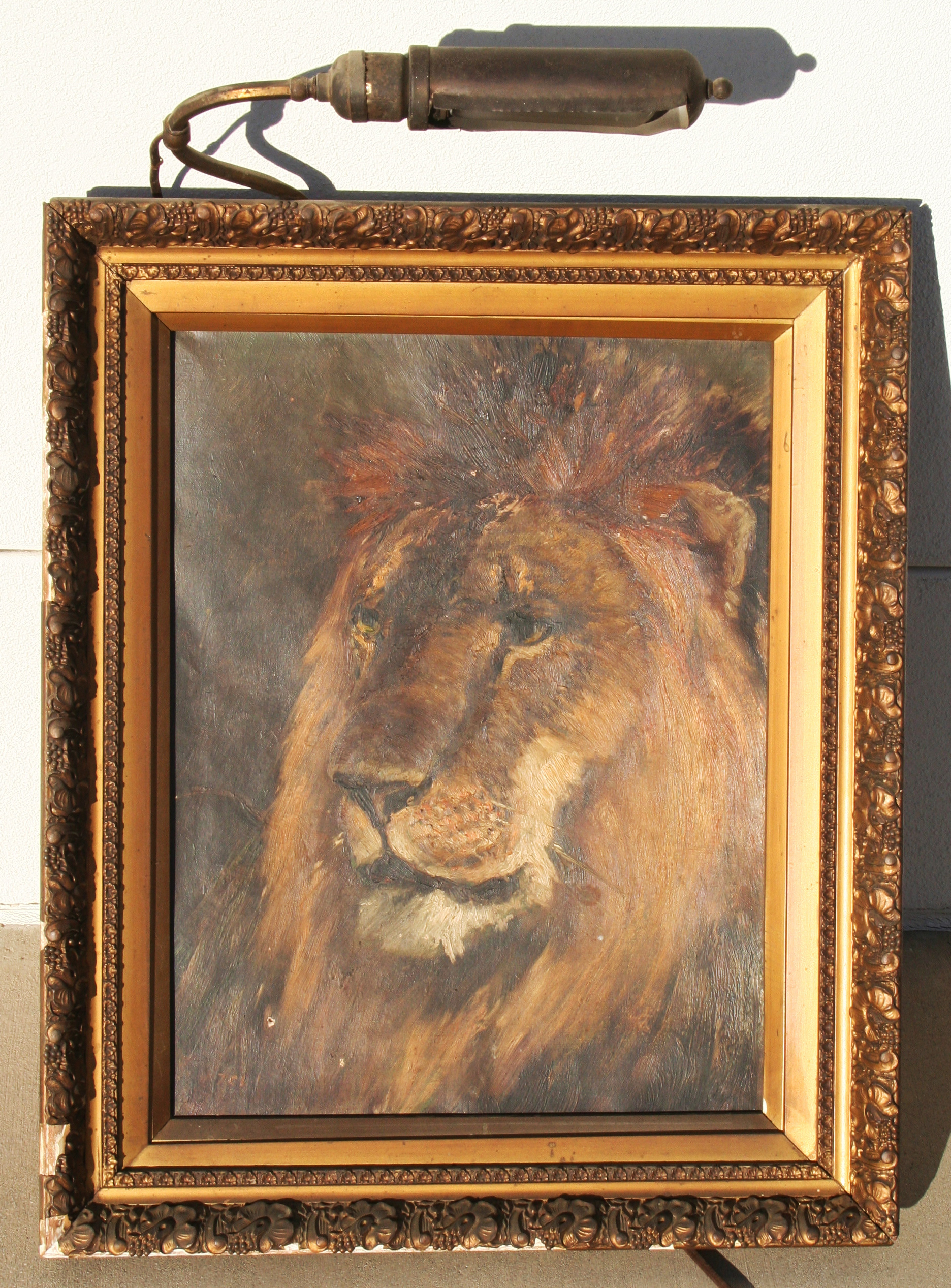 Painting of lion has been in family at least since my father was born (1933) as far as he knows.