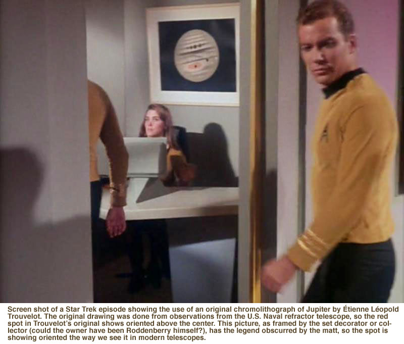 Screen shot of a Star Trek episode showing the use of an original chromolithograph of Jupiter by Étienne Léopold Trouvelot. The original drawing was done from observations from the U.S. Naval refractor telescope, so the red spot in Trouvelot’s original shows oriented above the center. This picture, as framed by the set decorator or collector (could the owner have been Roddenberry himself?), has the legend obscurred by the matt, so the spot is showing oriented the way we see it in modern telescopes.